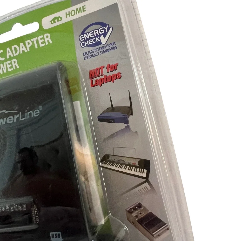 PowerLine Multi-Use AC Adapter with USB Power 3-12V 1300mA 7 Tips Universal